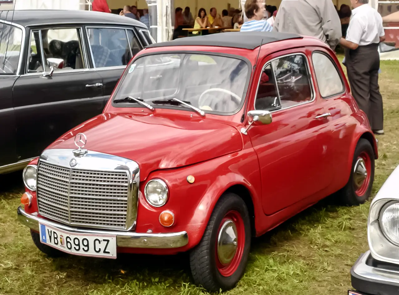 fiat-puch-500-neus-mercedes-volledig Foto van een Fiat Puch 500 met de grille van een Mercedes-Benz. De foto dient uit te leggen dat het er maar net aan ligt hoe je je vraag verpakt.